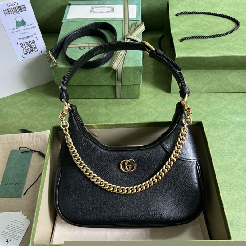 G*u*i top handle bags